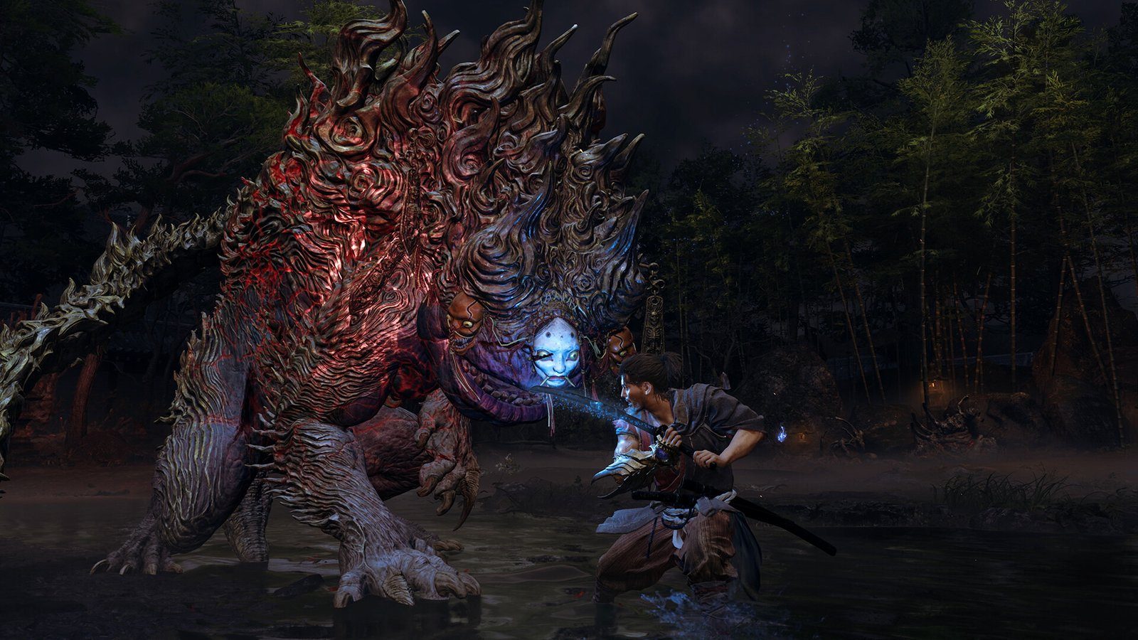 Musashi squares off against a towering Genma boss in a night swamp — the boss duels critics rank among the best in Onimusha: Way of the Sword