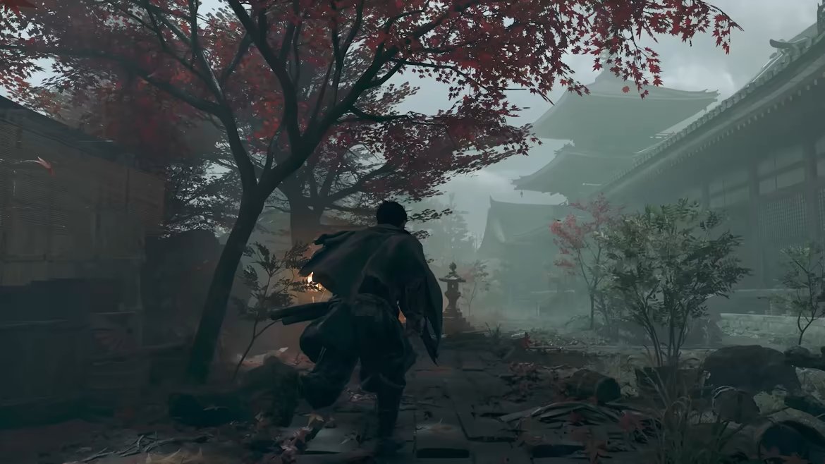 Musashi runs through an open-town Kyoto street beneath red maples — the optional hub that stretches Onimusha: Way of the Sword's 22-hour story toward 29